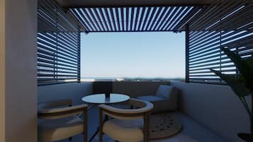 Estudi en suite júnior, vistes al mar | Terrassa o pati