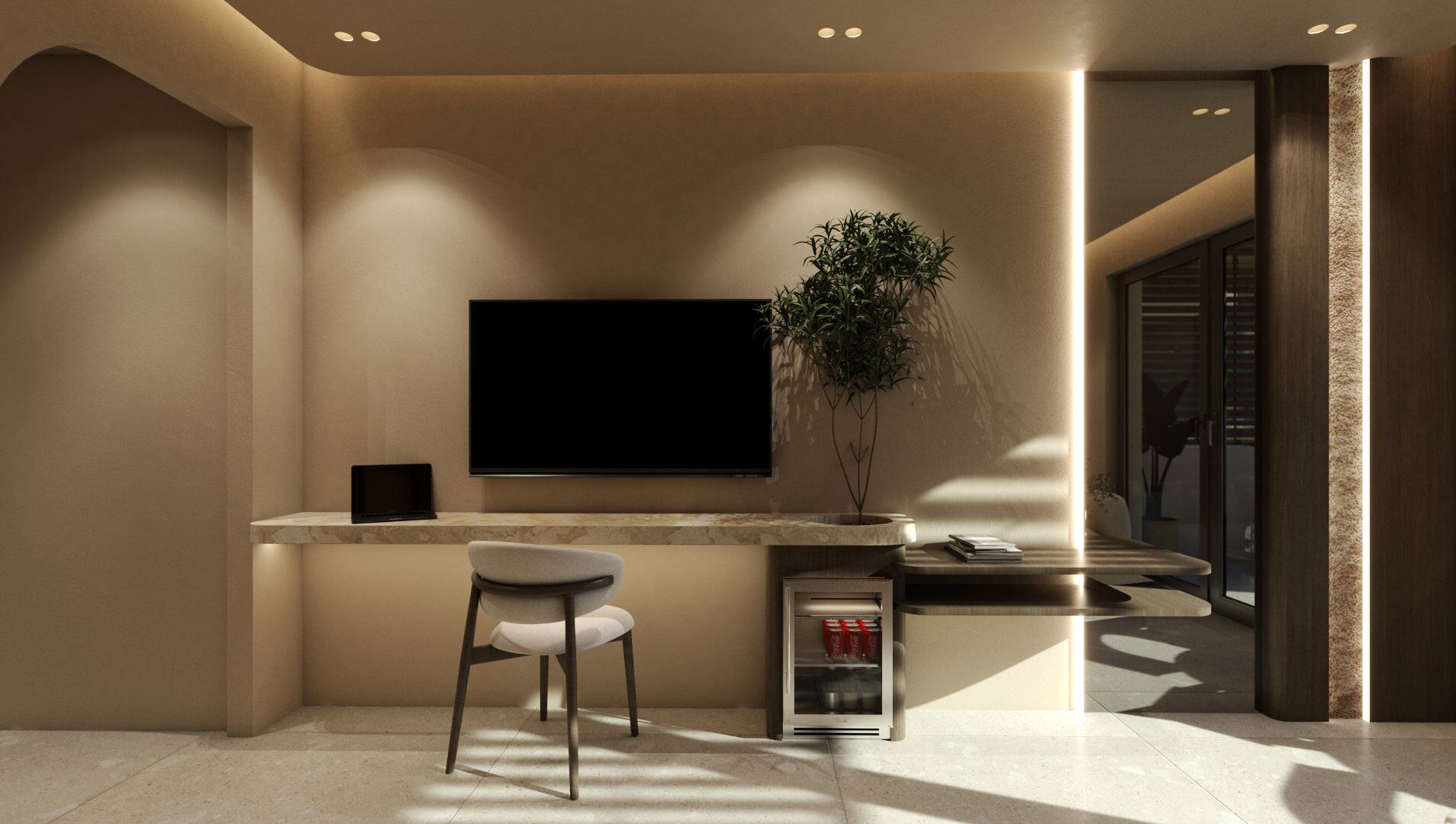 A modern, minimalist living area with a flat-screen TV mounted on the wall, a small seating area with a chair, a plant, and a mini-fridge with beverages.
