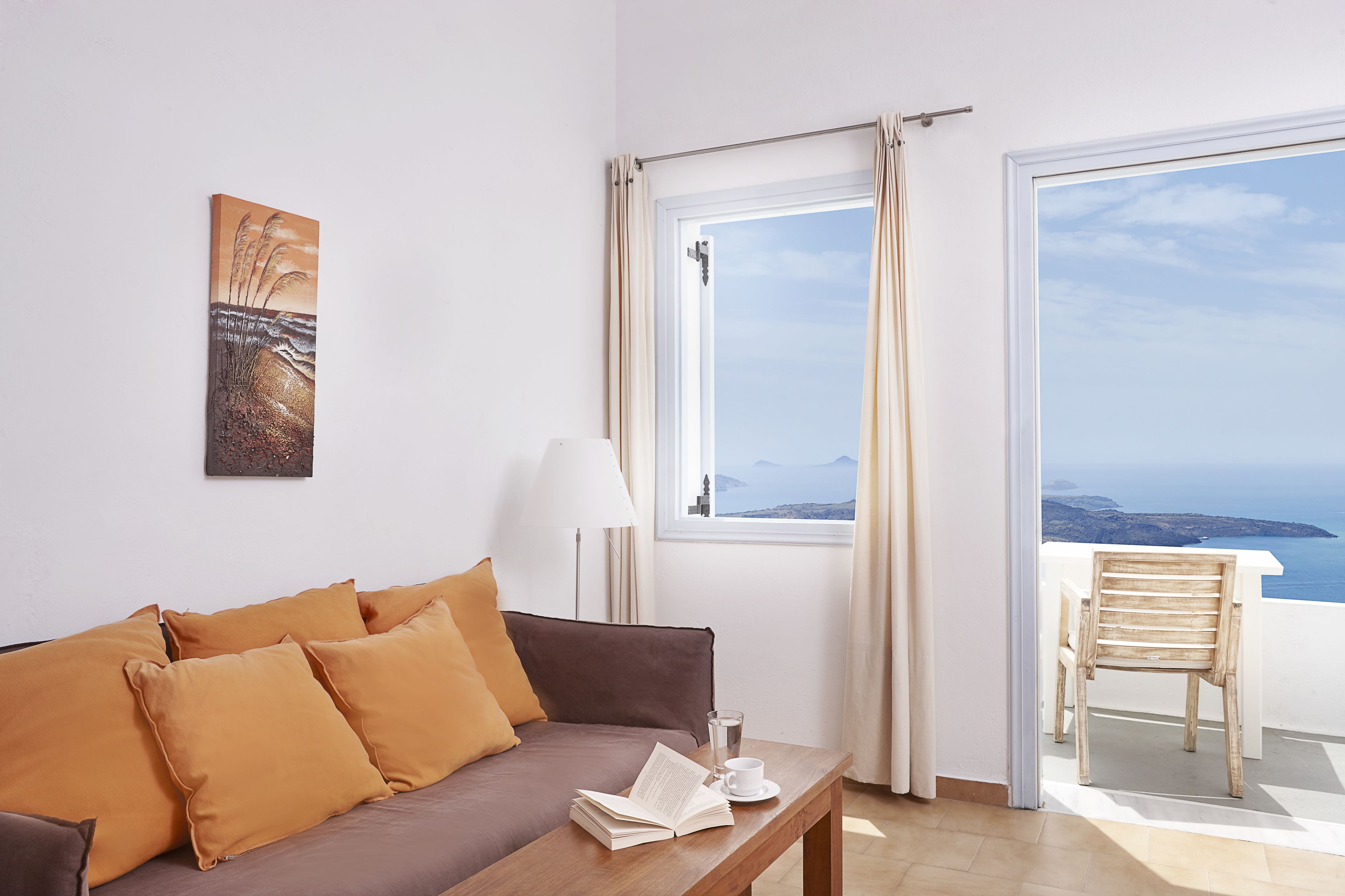 superior suite, sea view | living room | tv