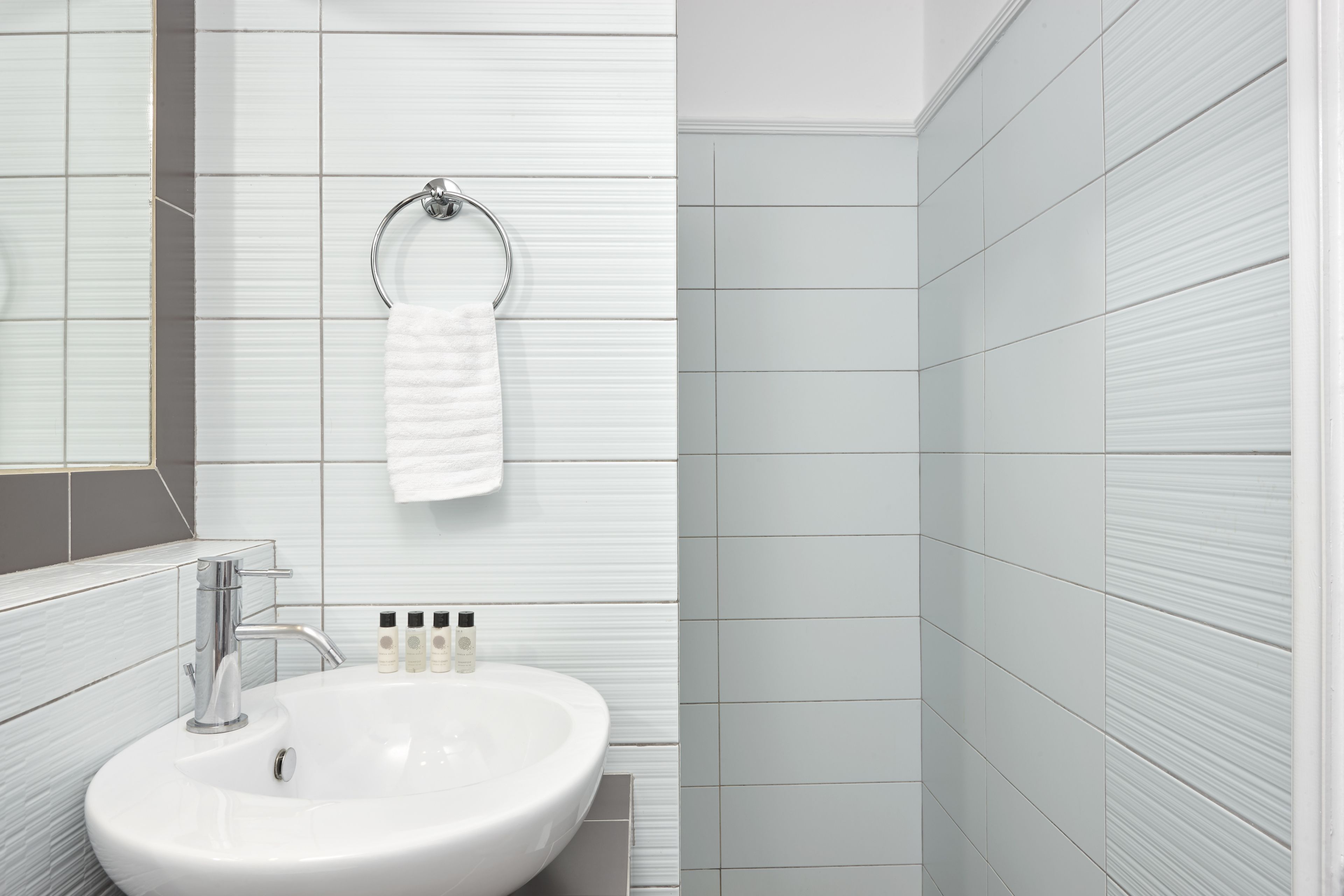 family suite, sea view | bathroom | shower, eco-friendly toiletries, hair dryer, towels