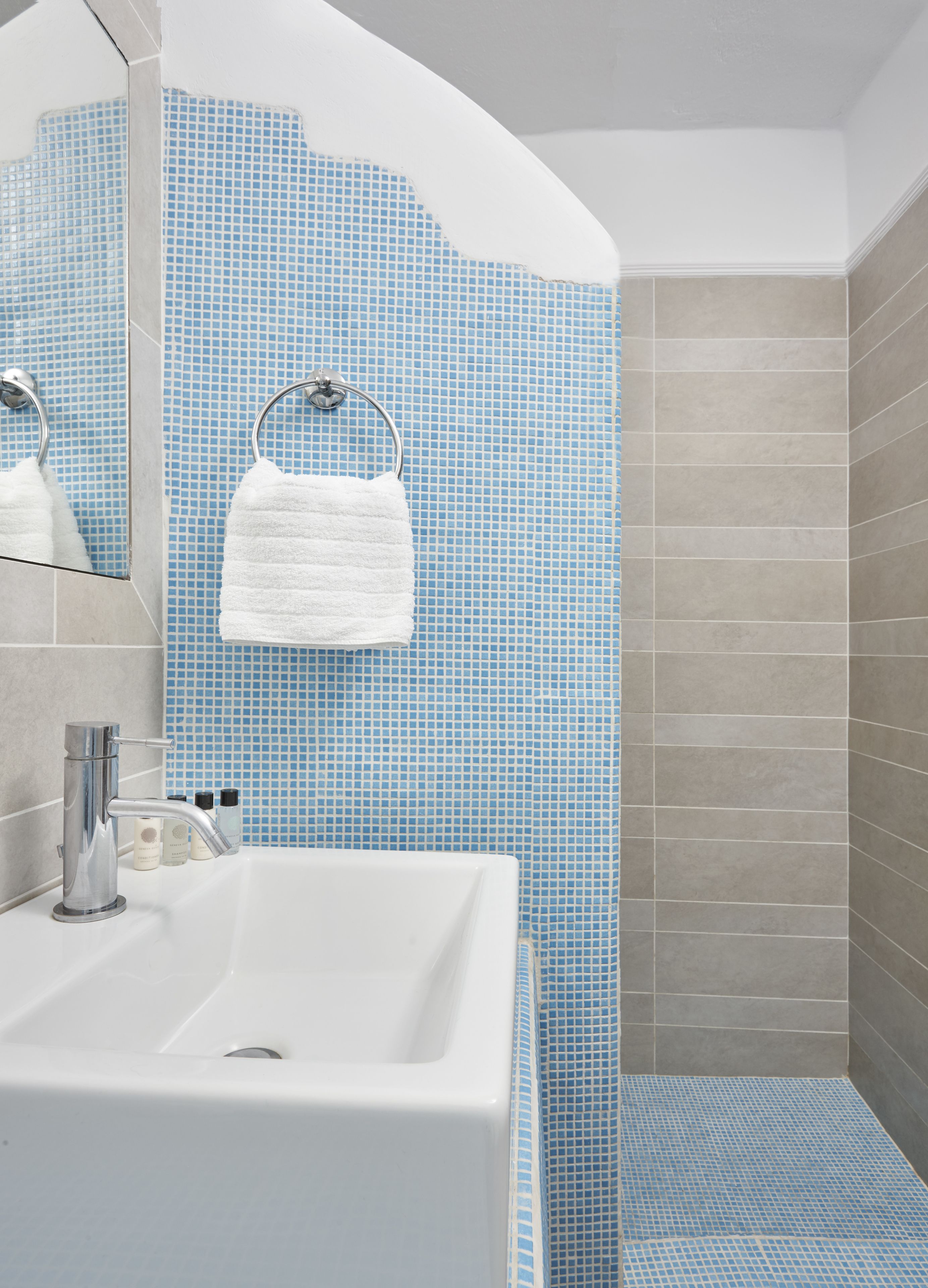 shower, eco-friendly toiletries, hair dryer, towels