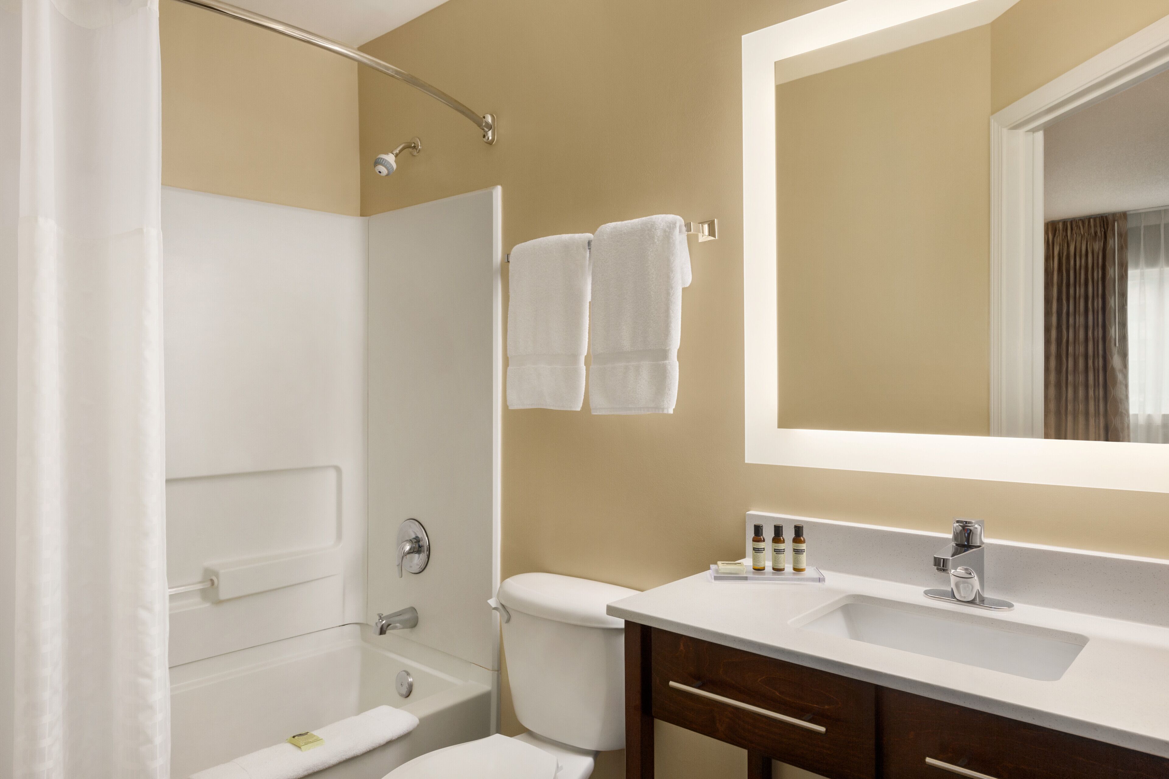 combined shower/bathtub, hair dryer, towels, soap