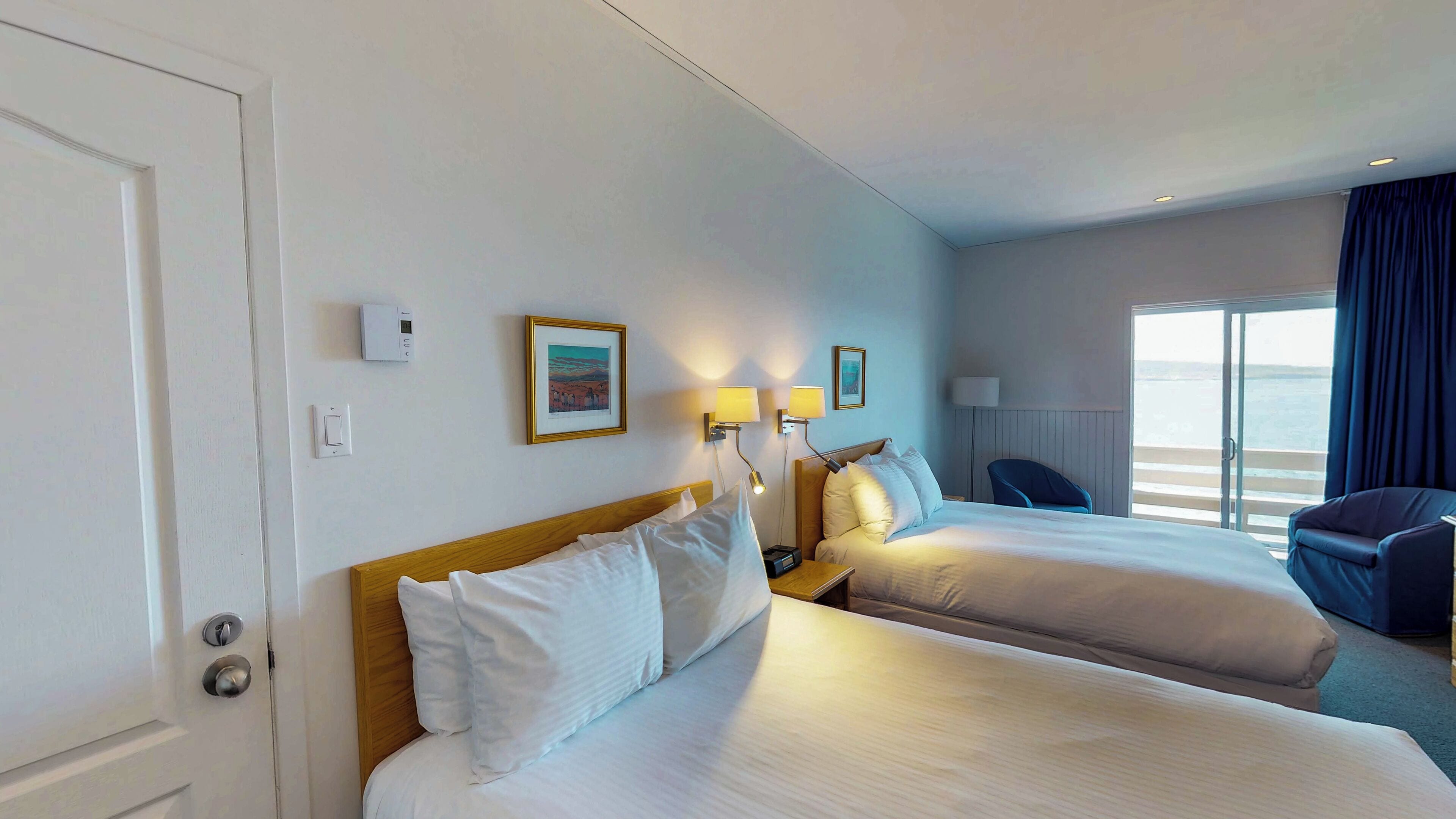 standard room, 2 queen beds, partial sea view (regular) | desk, iron/ironing board, rollaway beds, free wifi