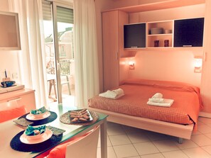 In-room safe, blackout drapes, iron/ironing board, travel crib