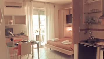 In-room safe, blackout drapes, iron/ironing board, travel crib