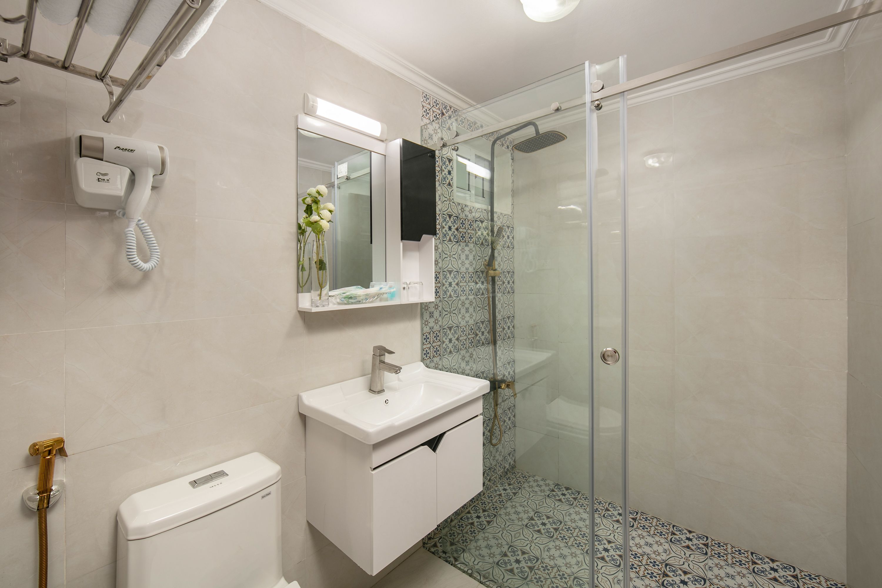 shower, rainfall showerhead, designer toiletries, hair dryer