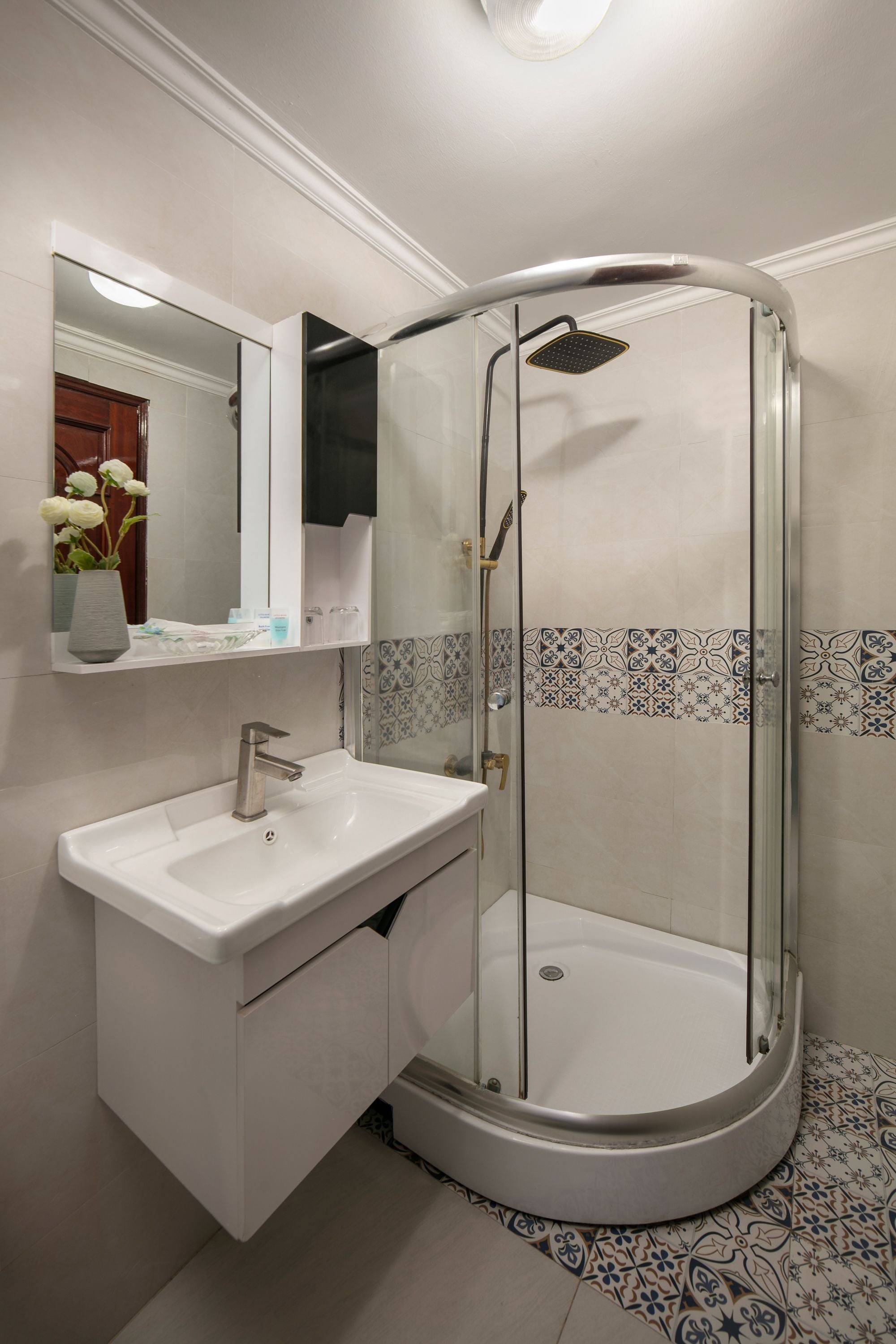 shower, rainfall showerhead, designer toiletries, hair dryer