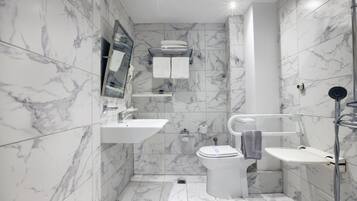 Economy Twin Room, Courtyard View | Bathroom | Free toiletries, hair dryer, towels