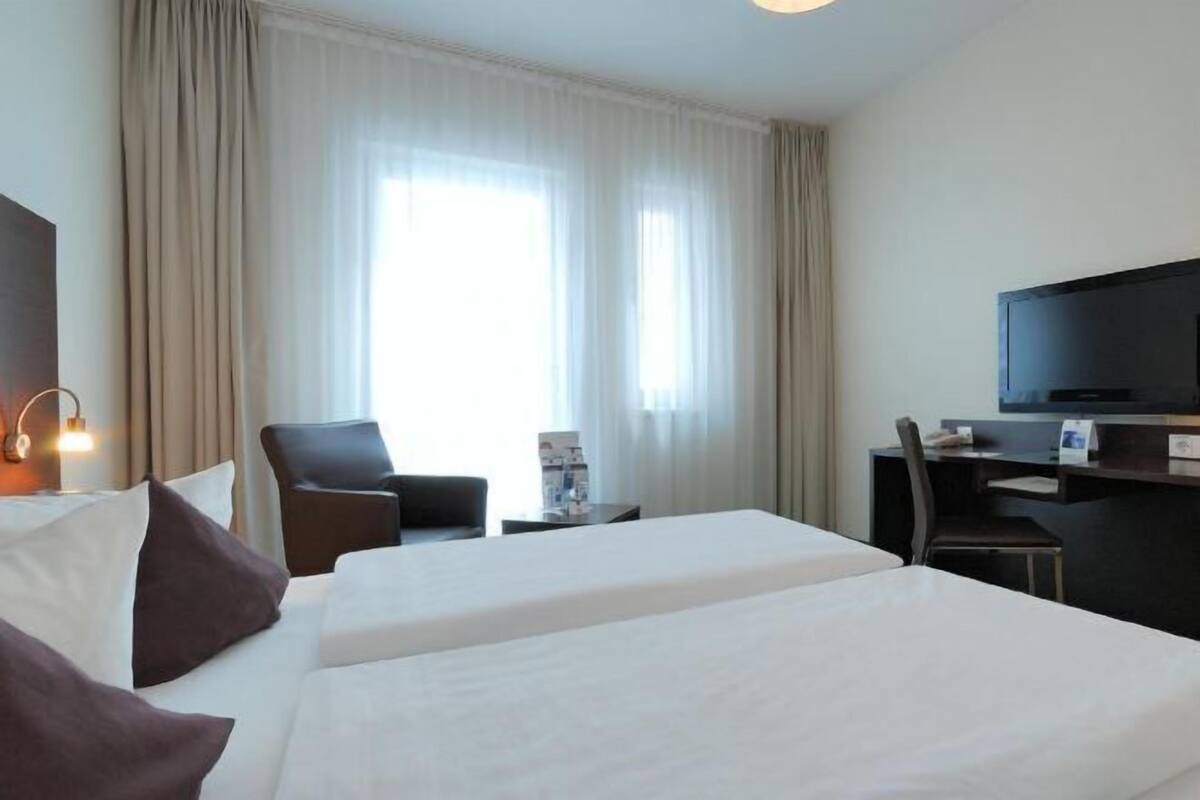 Blackout curtains, soundproofing, free WiFi, bed sheets
