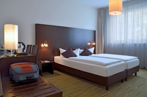 In-room safe, blackout drapes, soundproofing, free cribs/infant beds