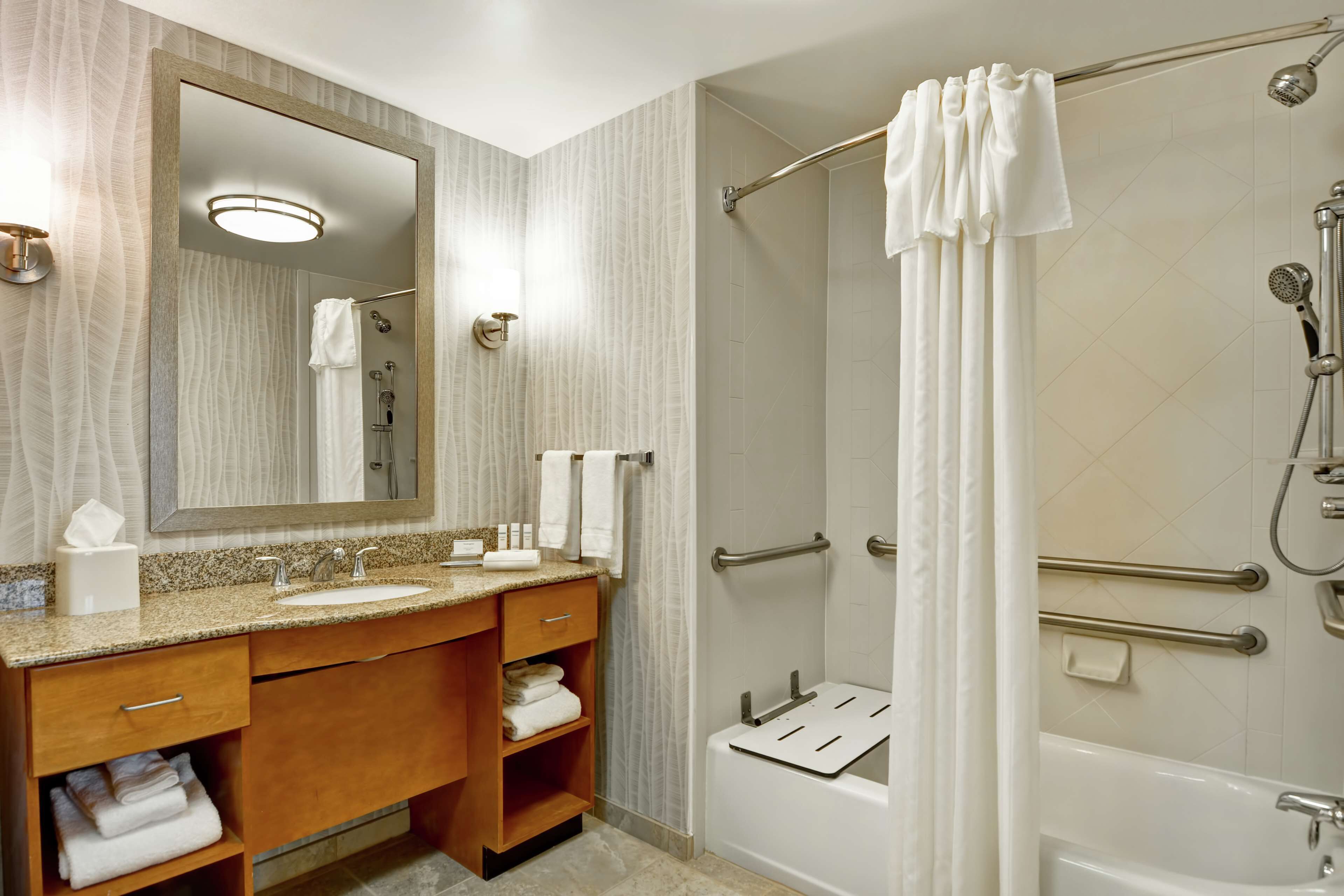 combined shower/bathtub, hair dryer, towels, soap