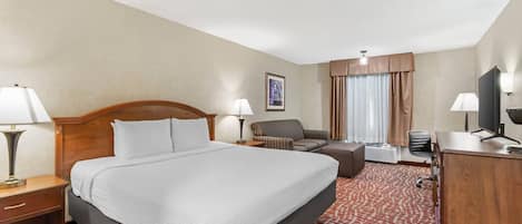 Room, 1 King Bed, Non Smoking (Upgrade) | Desk, laptop workspace, blackout drapes, soundproofing