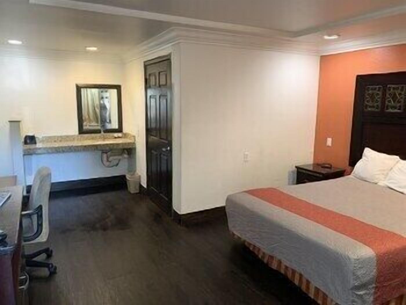 Desk, blackout curtains, free WiFi, bed sheets