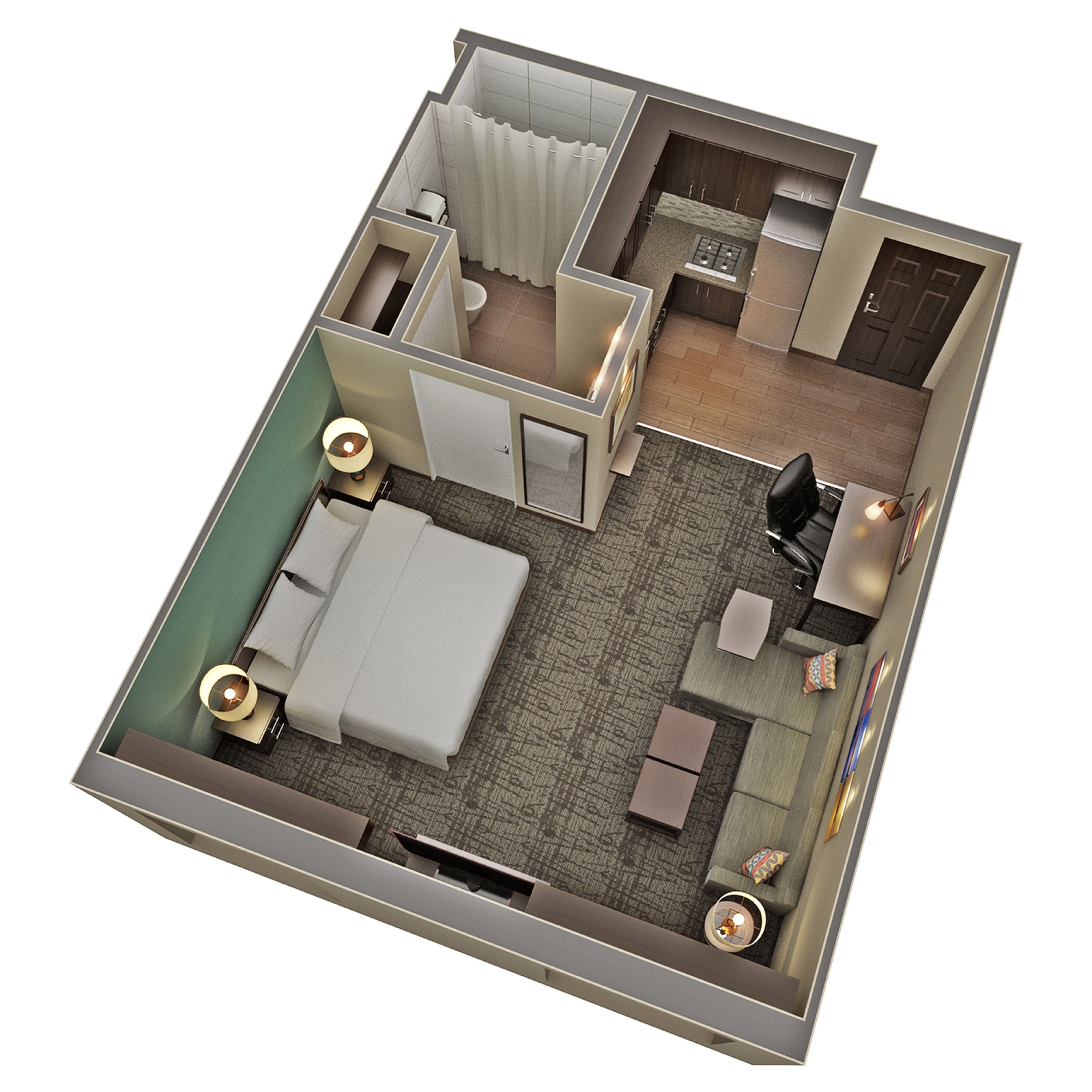 Une chambre d’hôtel comprenant un lit, un bureau, une chaise, un canapé, une petite table et une salle de bain.