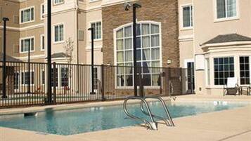 Seasonal outdoor pool, open 8:00 AM to 10:00 PM, sun loungers
