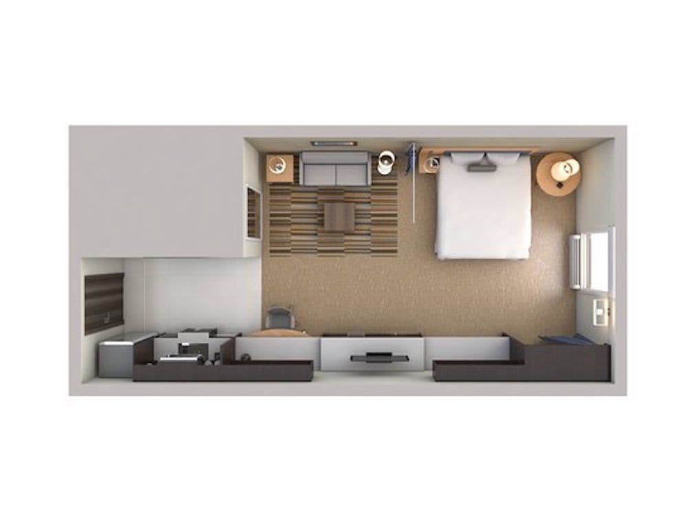 A modern kitchen with a central island, built-in appliances, and a large window.