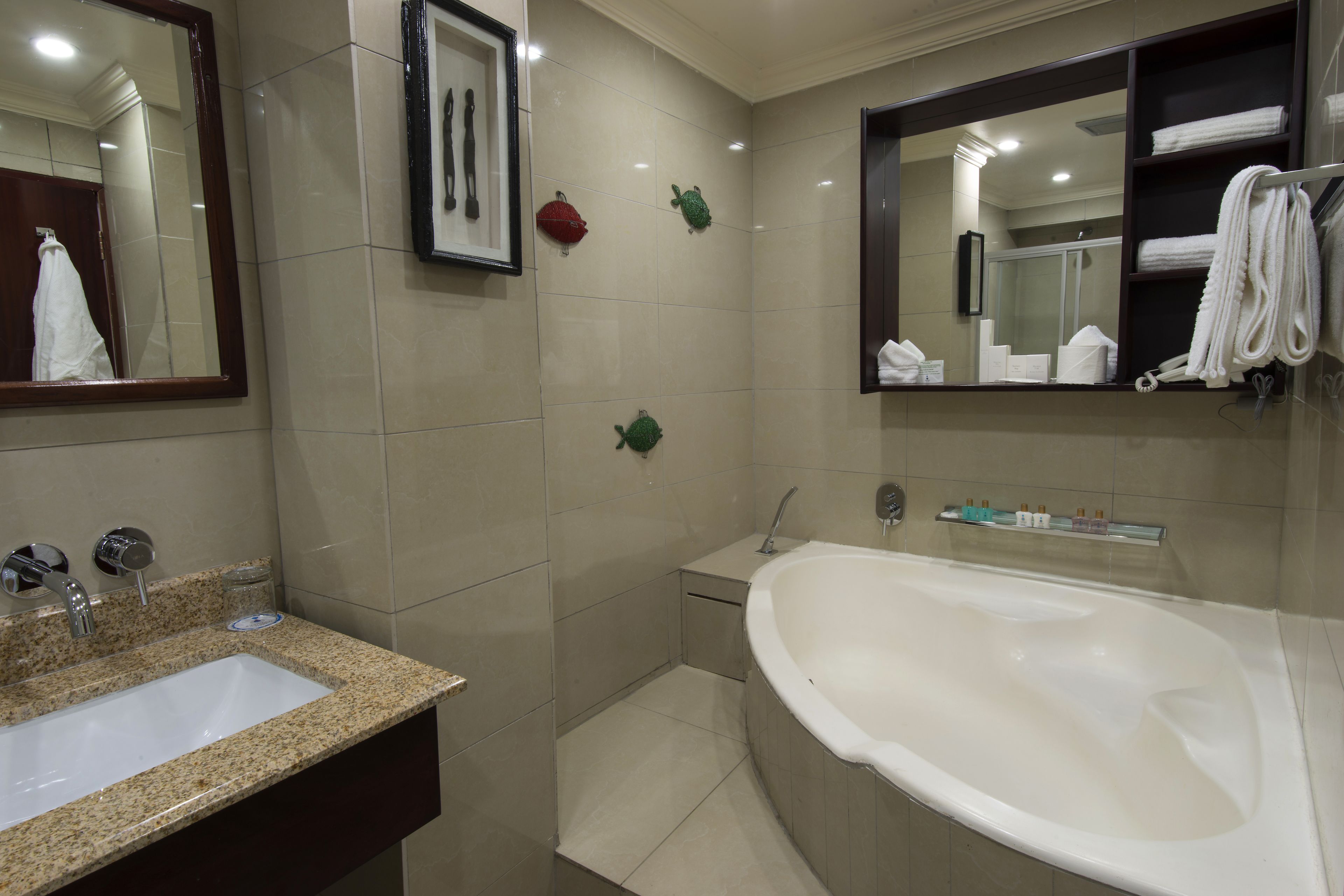 separate bathtub and shower, deep-soaking bathtub, free toiletries