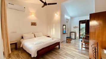 Deluxe Room, Garden View | Individually furnished, desk, laptop workspace, blackout curtains