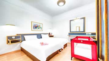 Desk, laptop workspace, blackout curtains, iron/ironing board