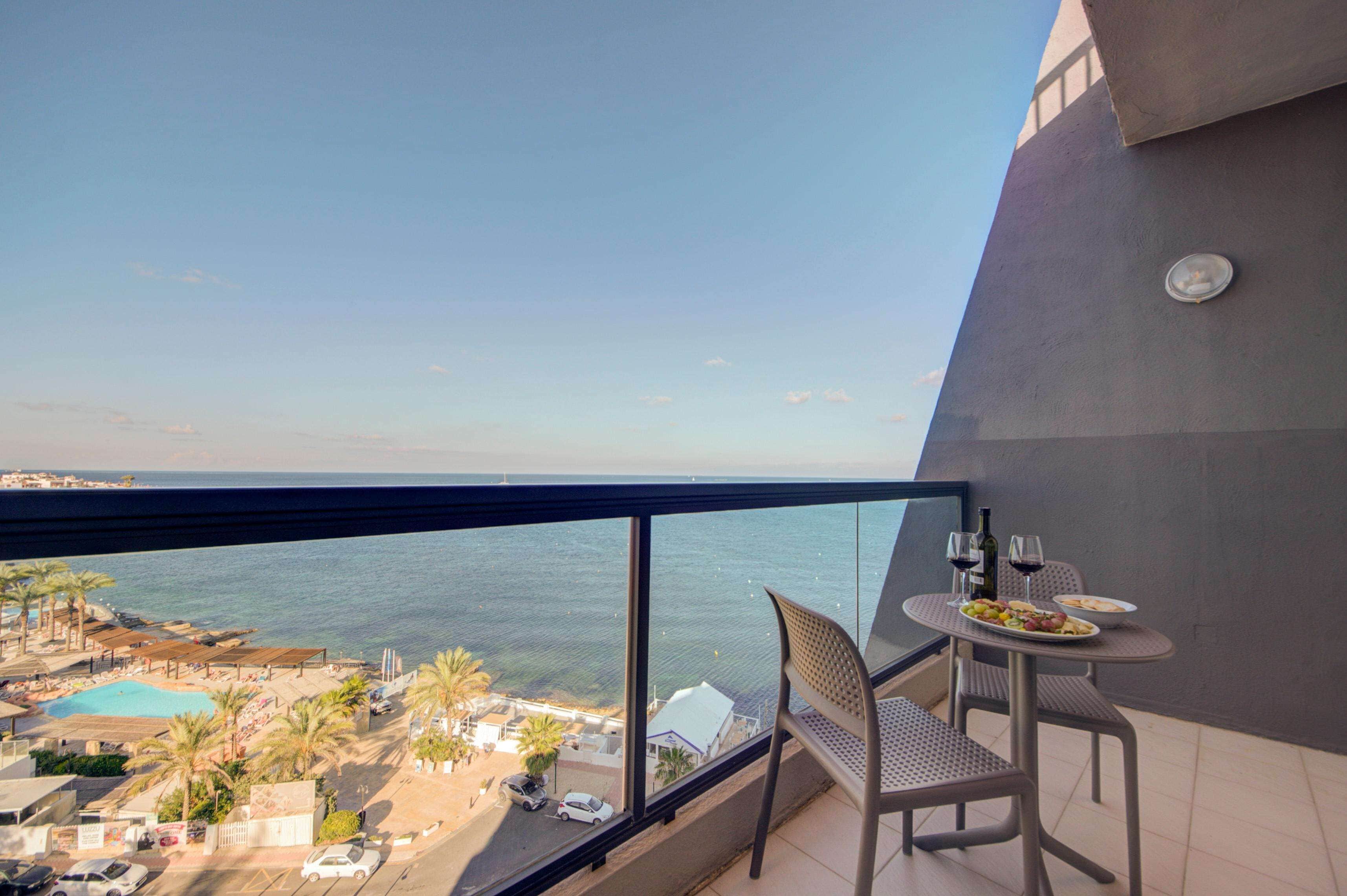 Desk, laptop workspace, blackout drapes, iron/ironing board