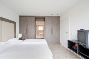 Suite ejecutiva | 1 habitación, minibar y caja de seguridad en la habitación 