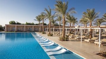 Outdoor pool, open 7 AM to 6:00 PM, pool umbrellas, pool loungers