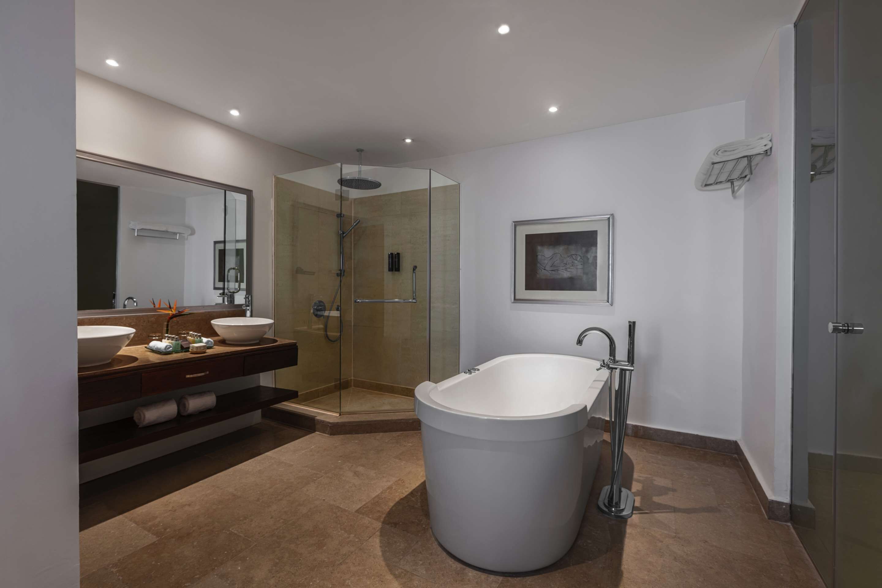 Designer toiletries, hair dryer, bathrobes, slippers