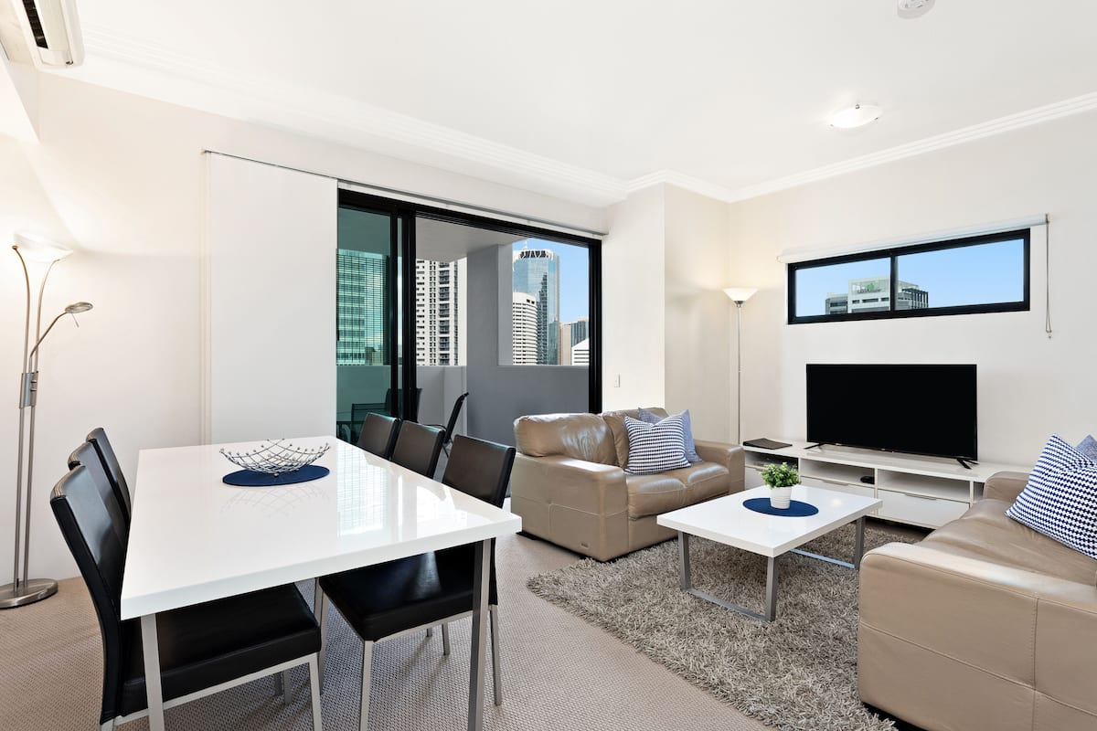 Apartment, 3 Bedrooms | Living area | Flat-screen TV