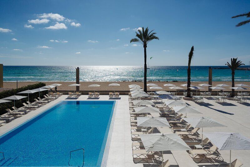 Indoor pool, seasonal outdoor pool, pool umbrellas, pool loungers