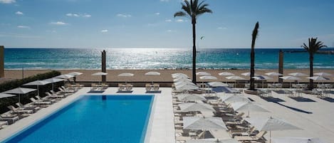 Indoor pool, seasonal outdoor pool, pool umbrellas, pool loungers