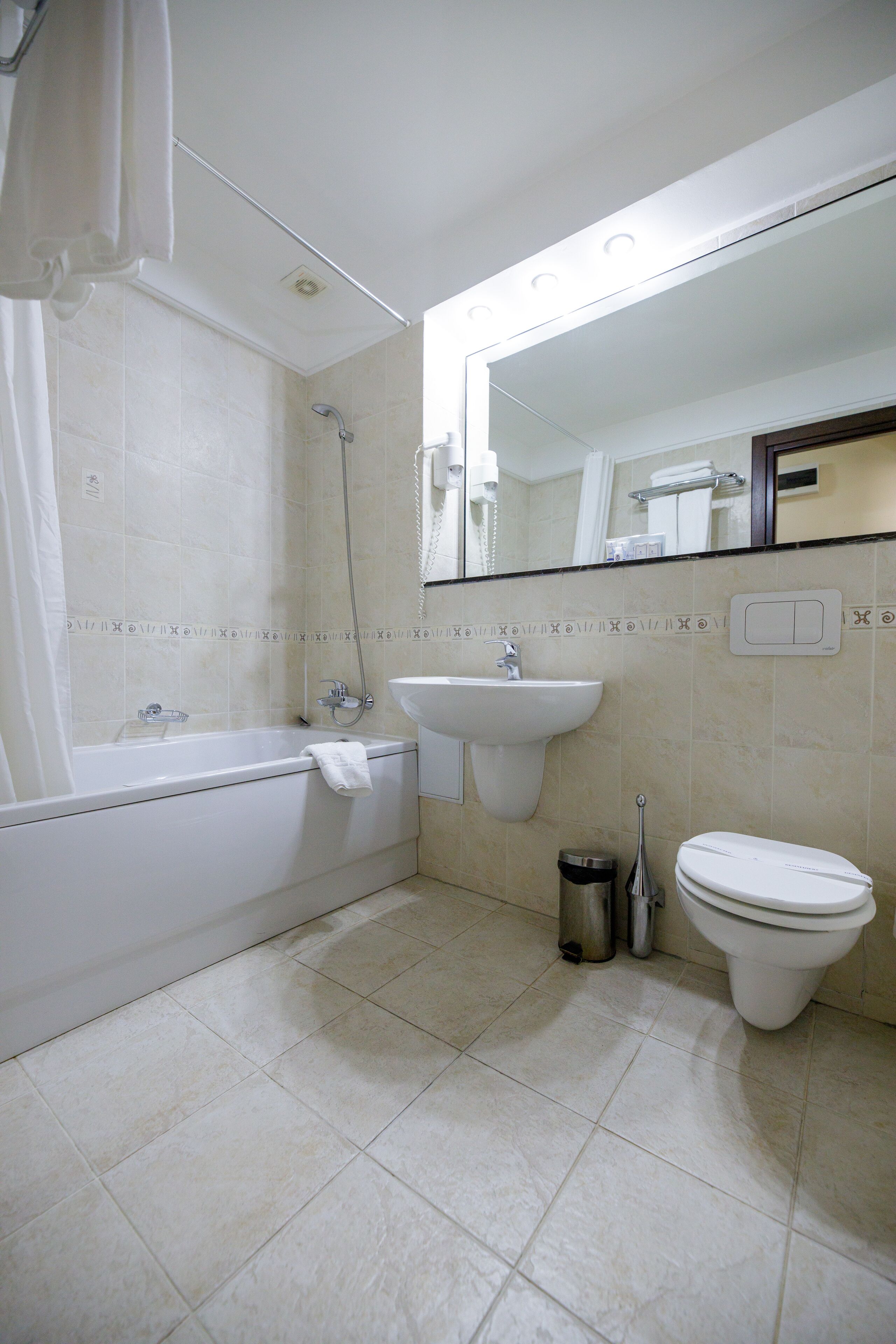 free toiletries, hair dryer, slippers, towels