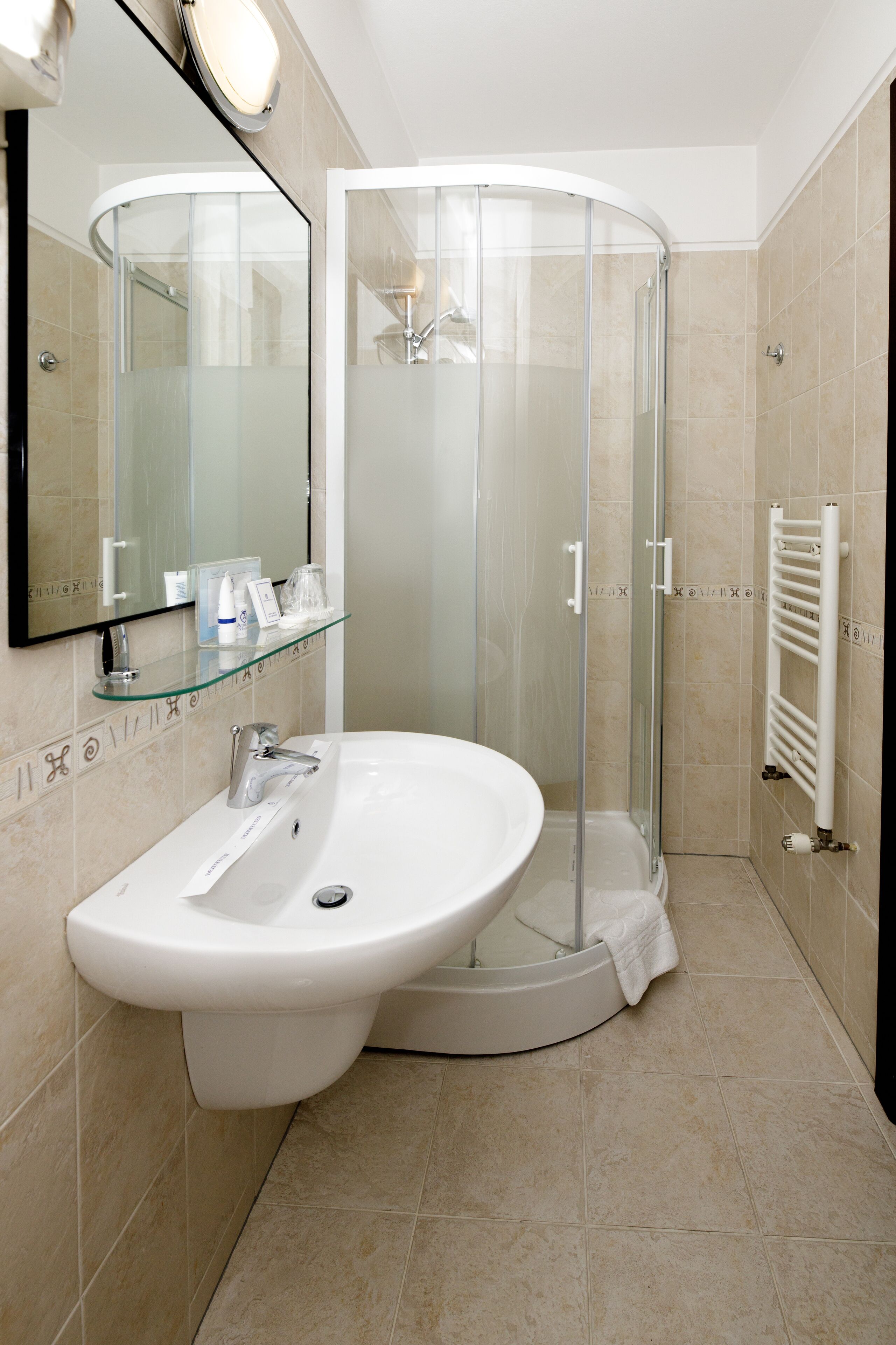 economy single room | bathroom | free toiletries, hair dryer, slippers, towels