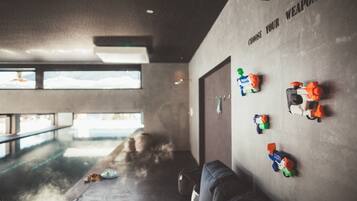 Indoor pool, open 7:00 AM to 10:00 PM, pool loungers