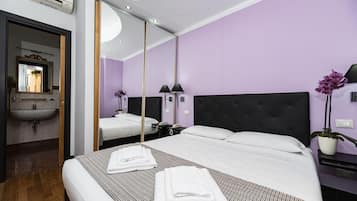 Standard Double Room | Minibar, in-room safe, desk, blackout curtains