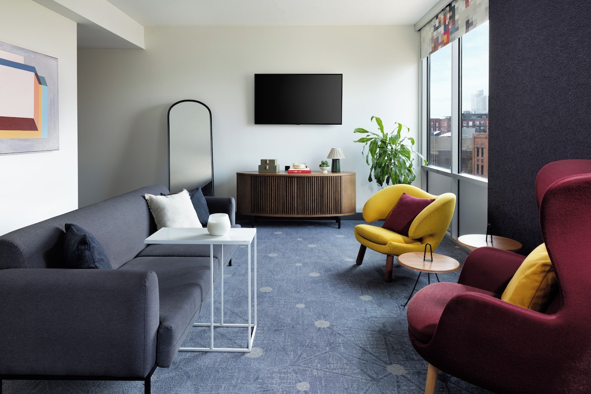 Suite, 1 Bedroom, City View | Living area | 55-inch flat-screen TV with digital channels, TV, Netflix