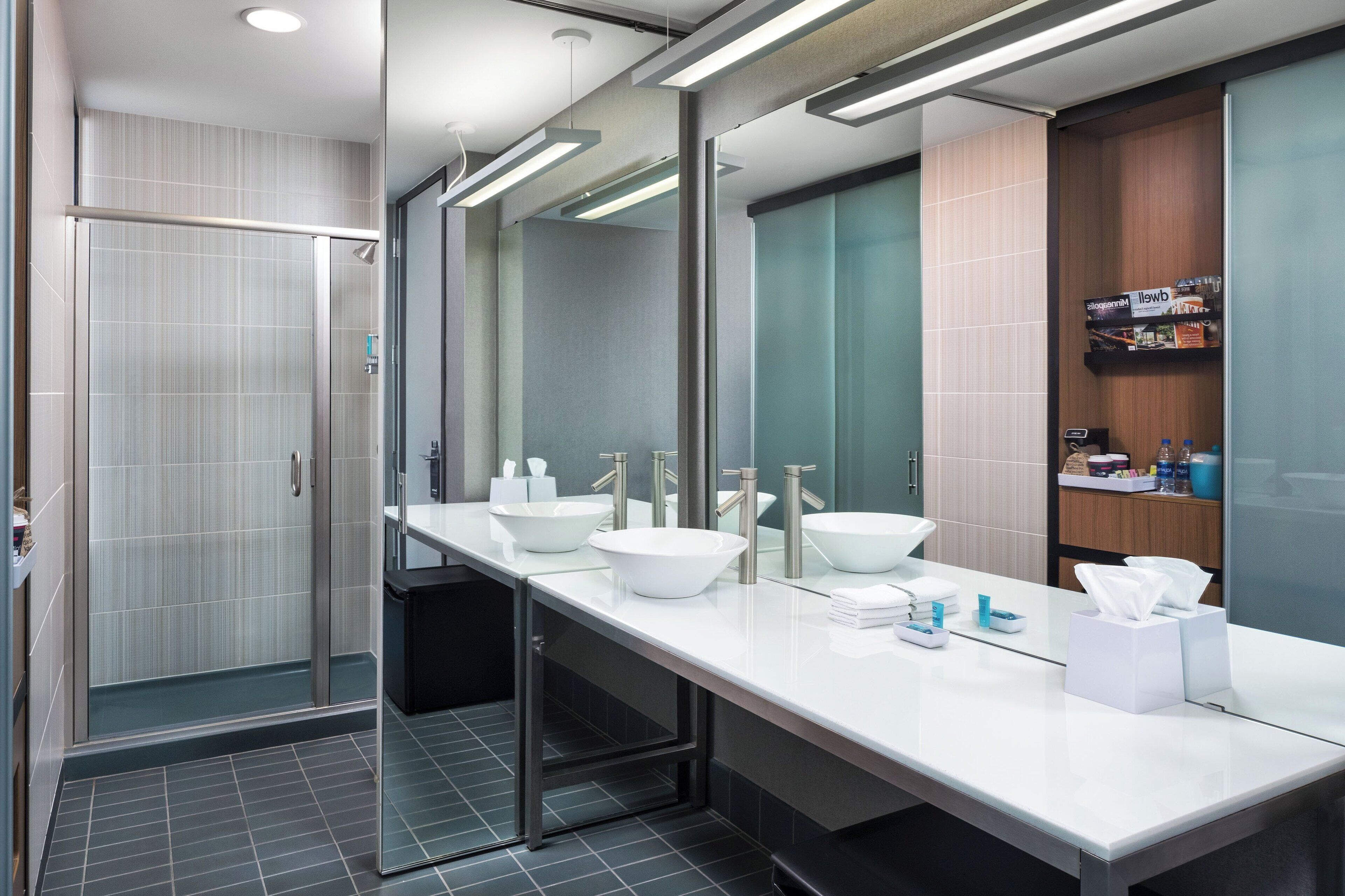 shower, designer toiletries, hair dryer, towels