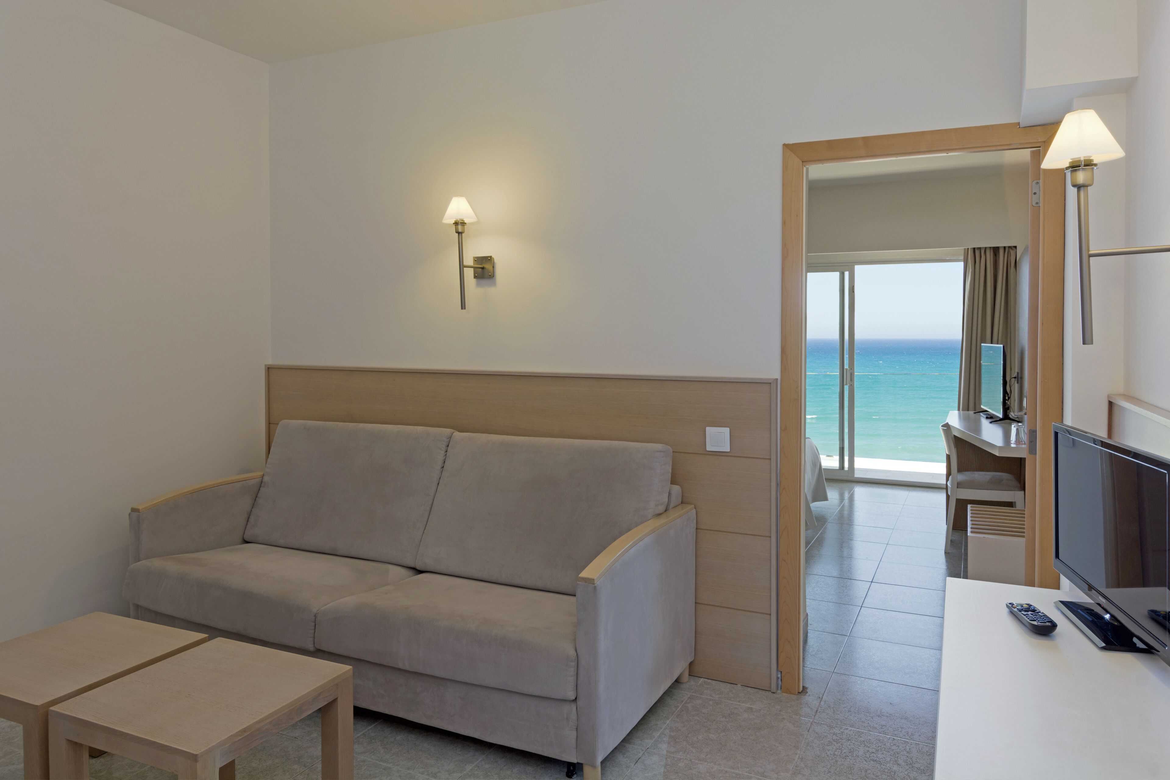 suite, 1 bedroom, balcony, sea view | 1 bedroom, in-room safe, desk, free wifi