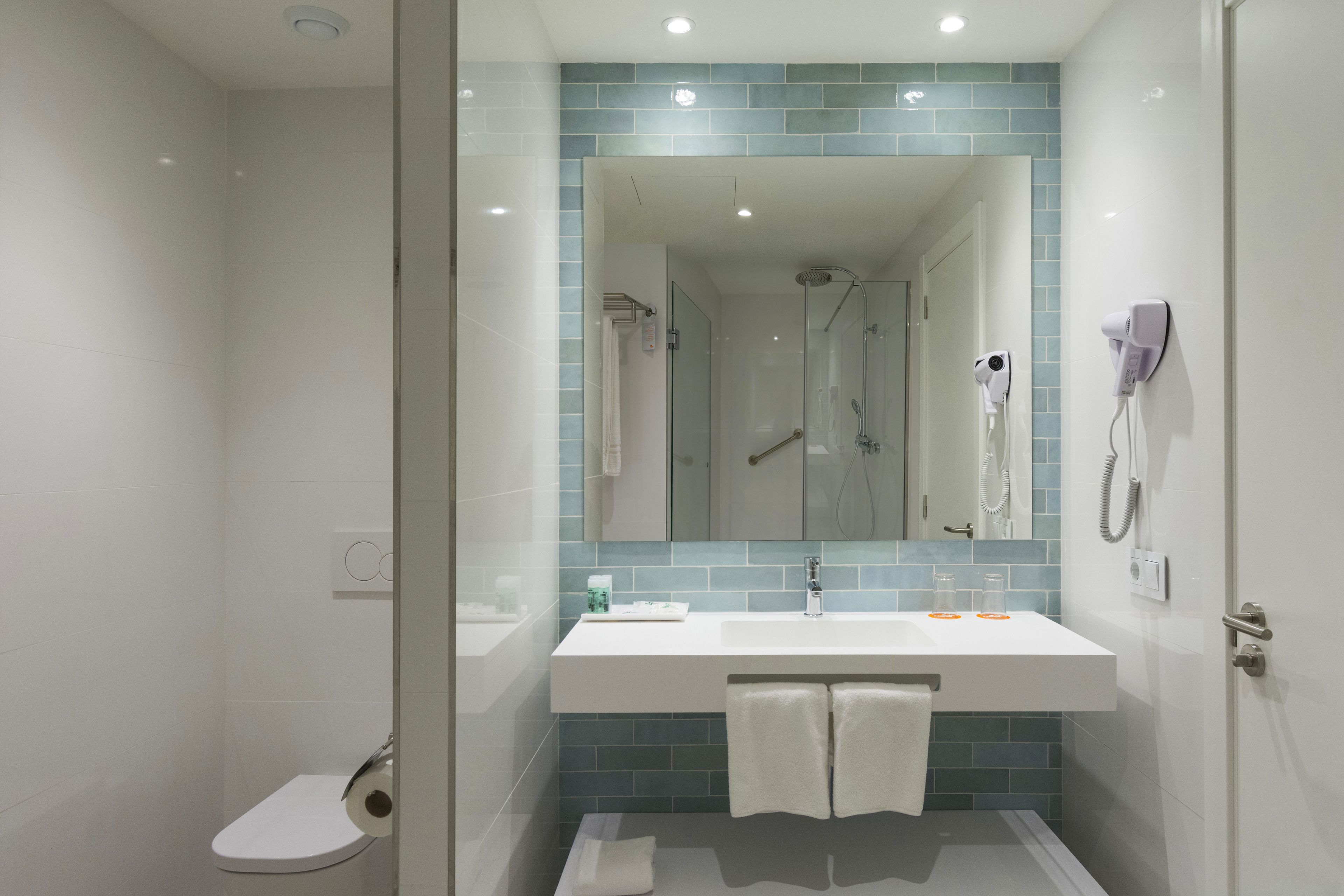 premium suite, 1 bedroom, balcony, partial sea view | bathroom | shower, free toiletries, hair dryer, towels