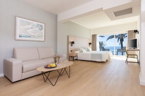 Junior Suite, Balcony, Sea View | In-room safe, desk, free WiFi, bed sheets