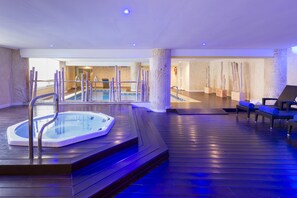 Indoor pool, outdoor pool, pool umbrellas, pool loungers