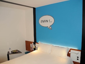 Premium bedding, blackout drapes, soundproofing, free WiFi