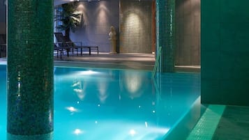 Indoor pool, open 8:00 AM to 9:00 PM, pool loungers