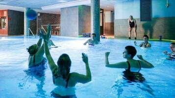 Indoor pool, open 8:00 AM to 9:00 PM, pool loungers