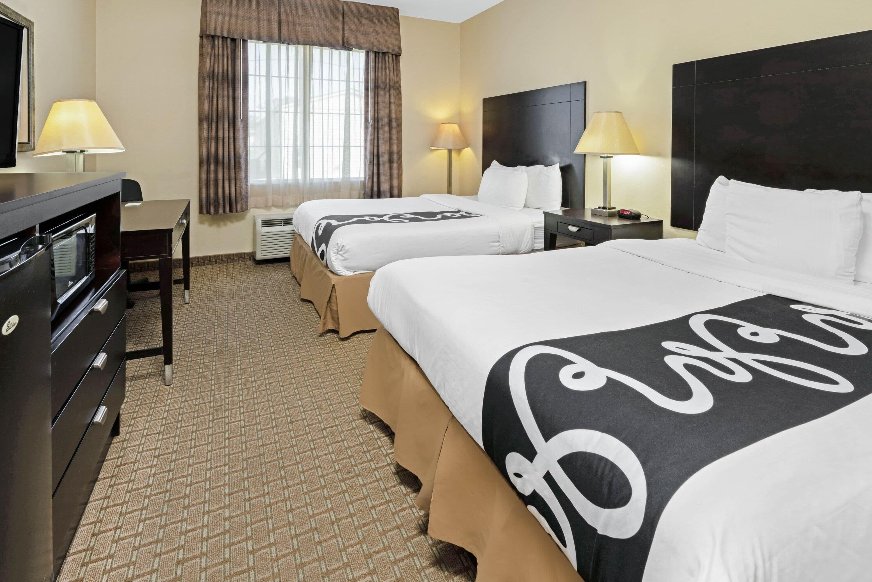 Family Suite, 2 Queen Beds, Non Smoking | Premium bedding, desk, laptop workspace, blackout drapes