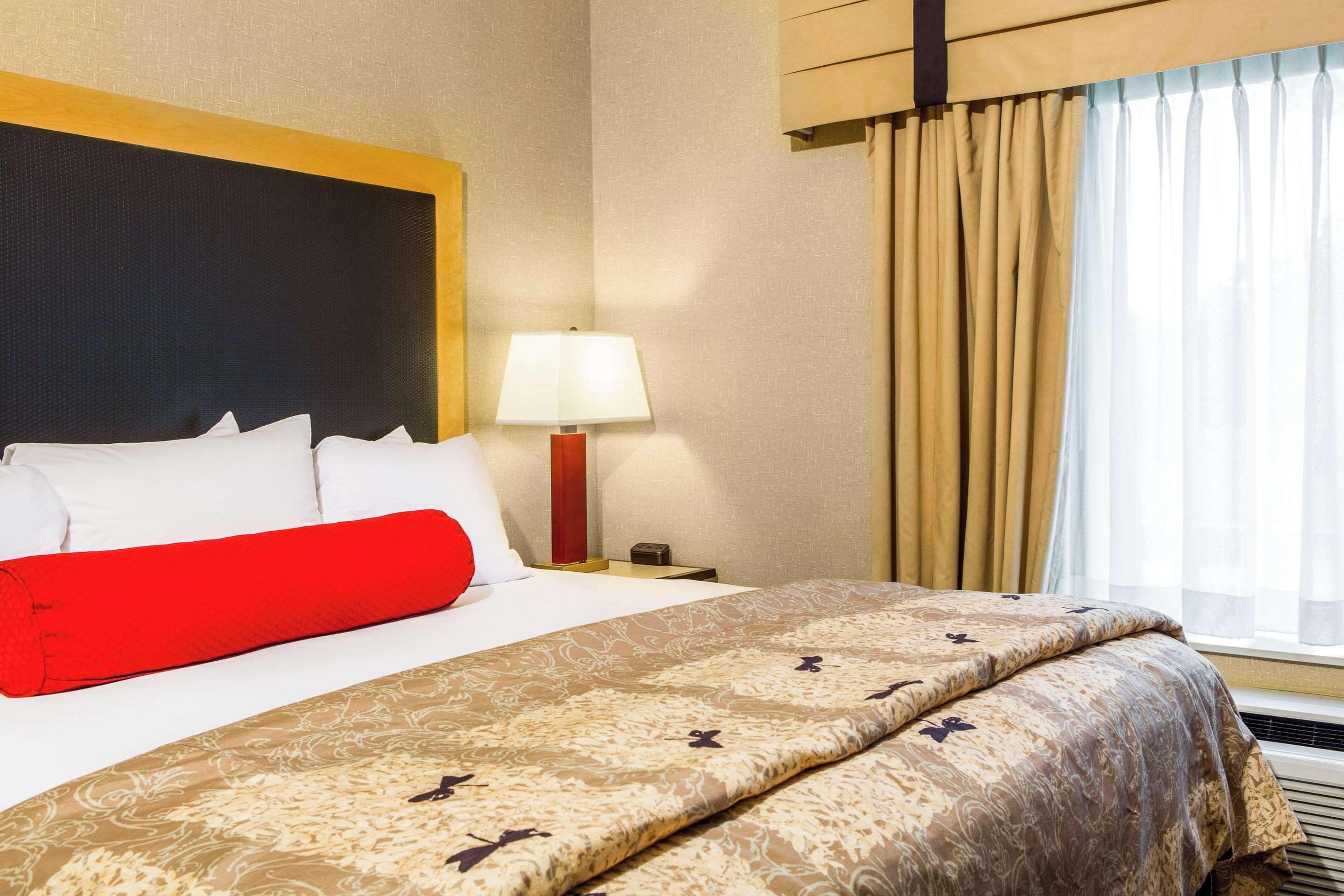 desk, blackout curtains, iron/ironing board, free cots/infant beds