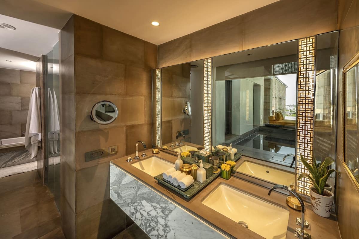 Bathroom | Designer toiletries, hair dryer, bathrobes, slippers