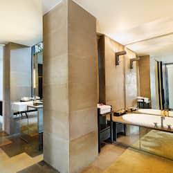 Designer toiletries, hair dryer, bathrobes, slippers