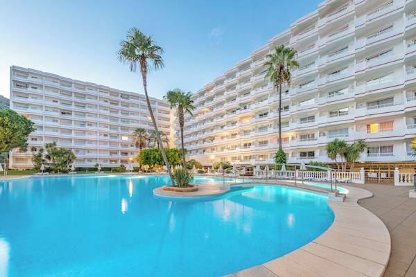 2 outdoor pools, open 9:00 AM to 9:00 PM, pool umbrellas, pool loungers