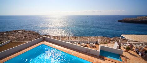 2 outdoor pools, pool umbrellas, pool loungers