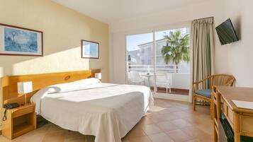 Een bureau, verduisterende gordijnen, geluiddichte muren, gratis wifi